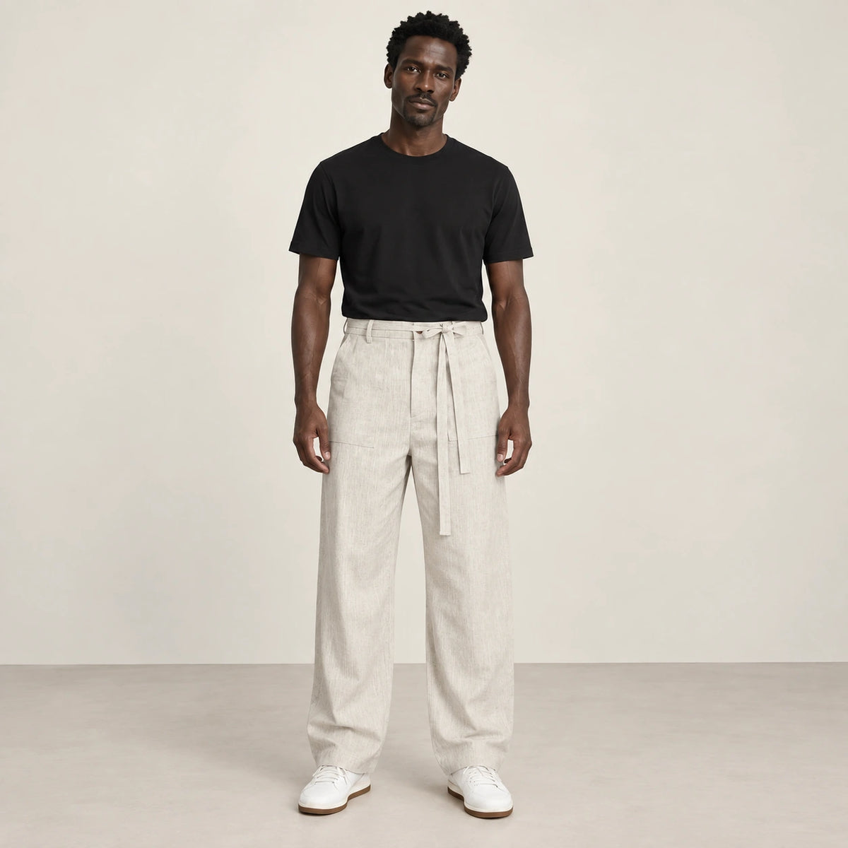 Pantalon beige à ceinture à nouer, face dans le studio IVAREE