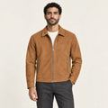 Veste en cuir café, face dans le studio IVAREE