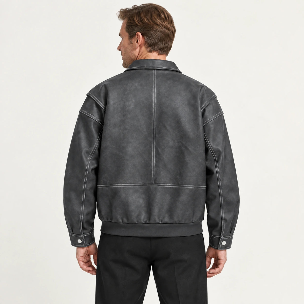 Veste en cuir gris foncé, dos dans le studio IVAREE
